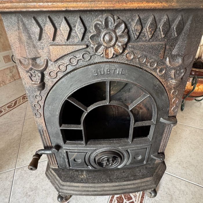 Vendo salamandra antiga a lenha