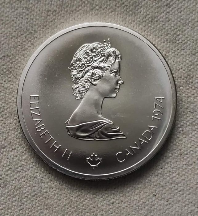 Дивовижна срібна монета. 10 доларів 1974 року " Лакросс" 48,6 грам