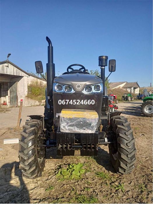 Мінітрактор СКАУТ TY-404 примусова реверс біля керма колеса збільшени