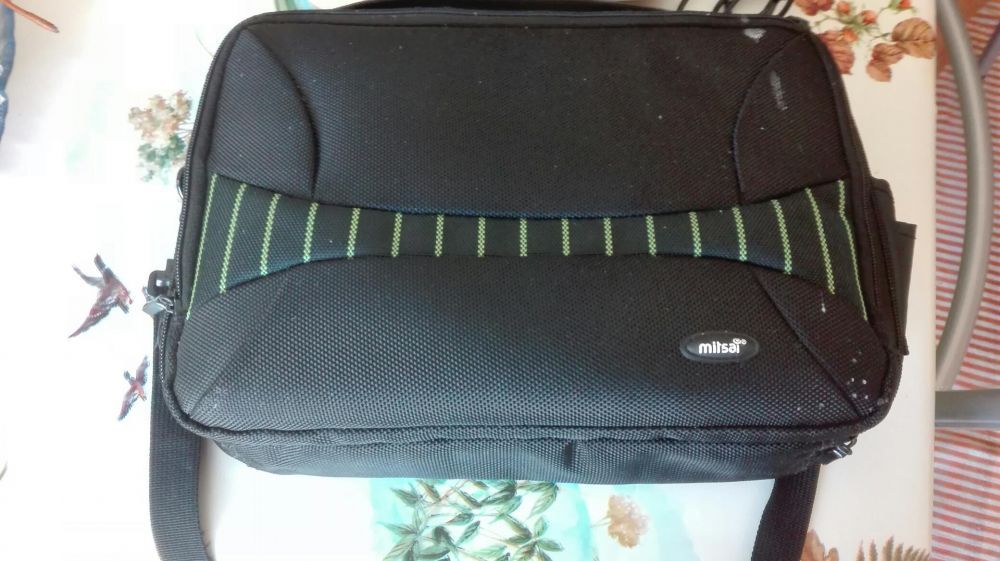 Leitor de dvd com carregador de isqueiro e mochila