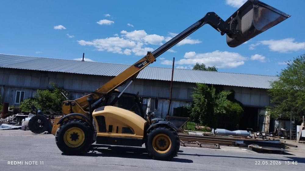 Продам телескопический погрузчик cat 407 c