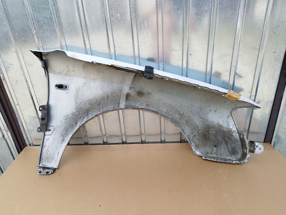 blotnik lewy przod audi a4 b7 cabrio 2004-2008 kolor ly7w