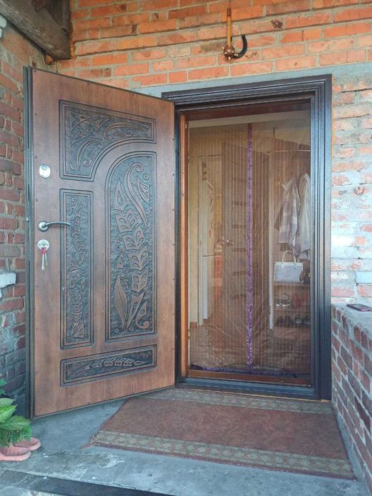 Продається затишний будинок з ремонтом в Богодухові