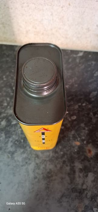 Latas antigas de lubrificantes