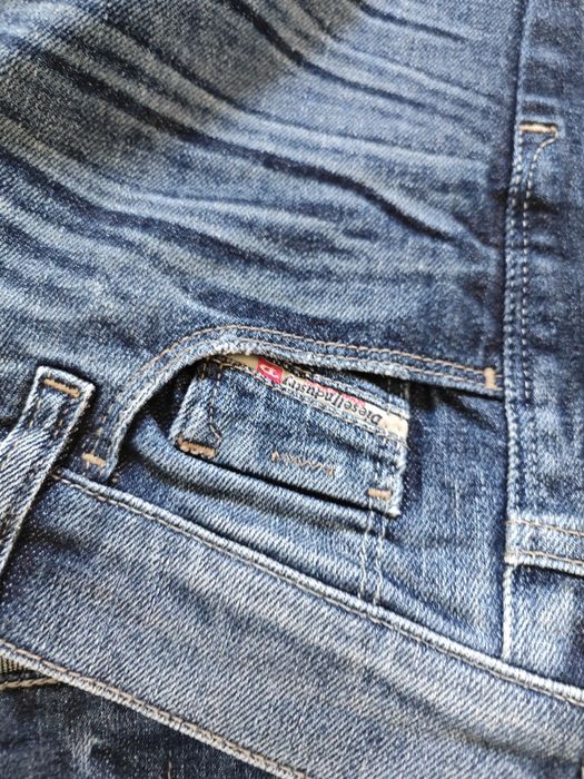 Damskie spodnie Diesel rozmiar E27 L32