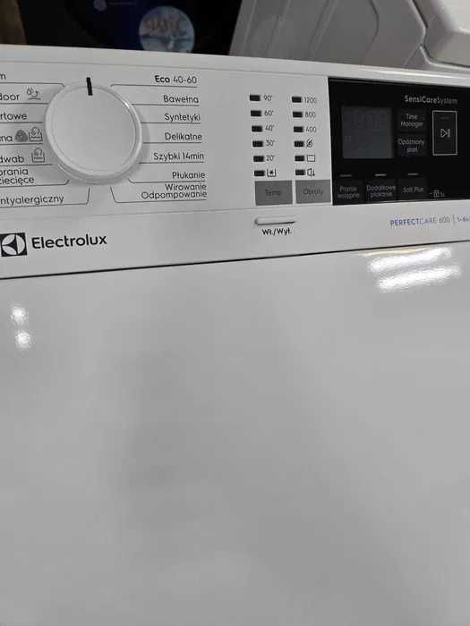 Вертикальна пральна машинка Electrolux EWT1136 бу стан топ стиральная