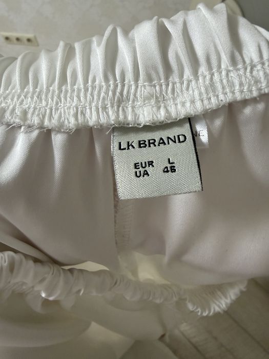 Білі атласні брюки