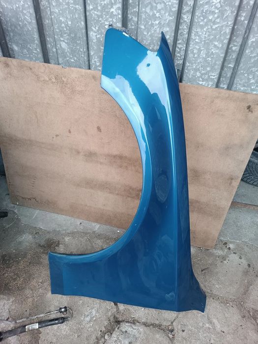 AUDI A4 B8 LX5V NIEBIESKI BŁOTNIK PRZEDNI LEWY