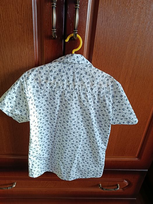 Sprzedam elegancką koszulę r.128 stan bardzo dobry