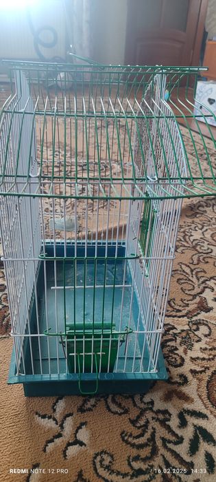 Клітка для попугайв