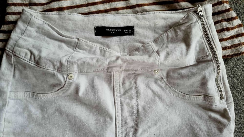 Spodnie jeans 34 Reserved