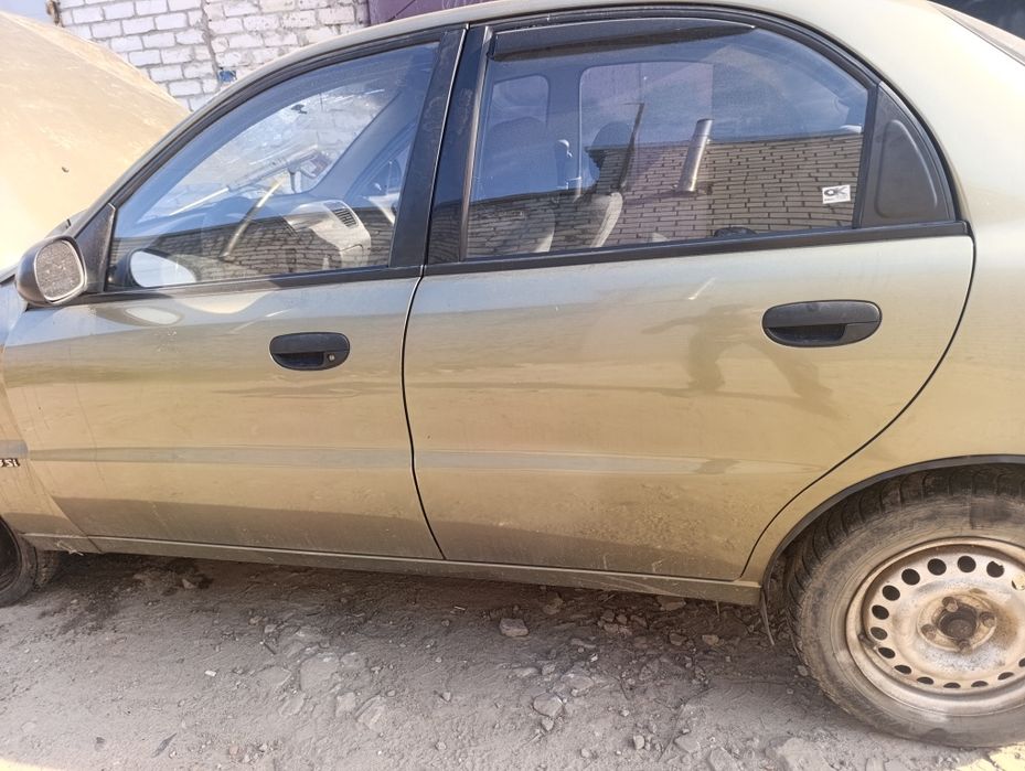 Двері Daewoo сенс ланос з сидінням