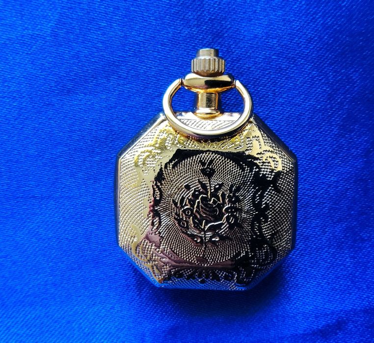 2126#Relogio bolso quartz Novo com pilha a trabalhar nunca foi usado