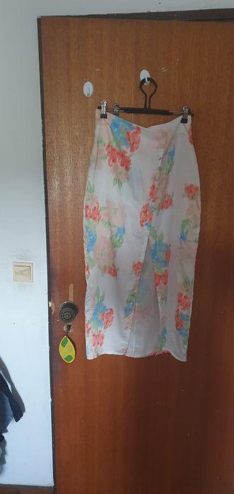 Conjunto de tope e saia comprida