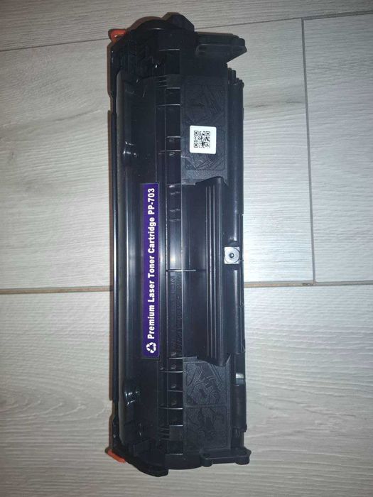 Новий картридж  Canon 703