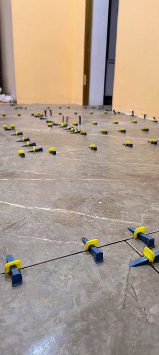 укладання плитки, плиточні роботи, керамограніт, облицювання груби