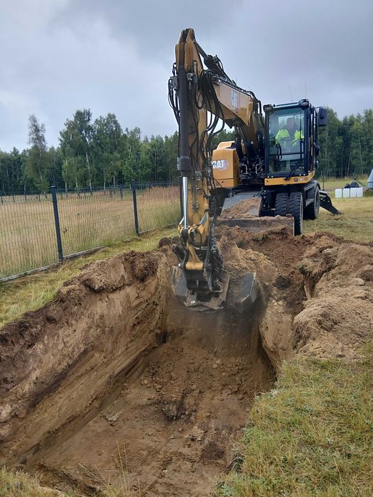 Usługi Koparką Prace Ziemne Wykopy Pod Fundamenty Płyty Fundamentowe Drogi Szamba Niwelacja Terenu