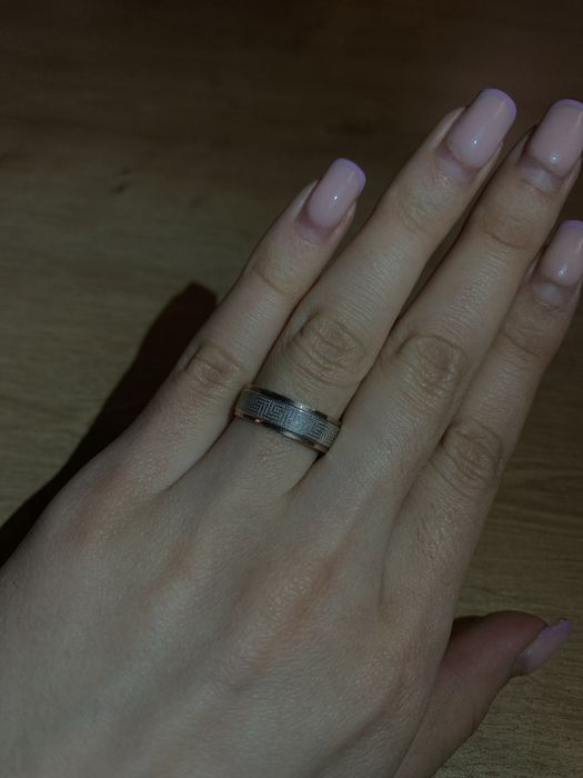 Серебряна каблучка з золотими вставками