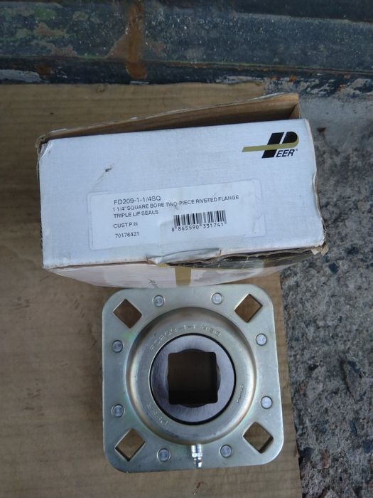 Продам підшипник в корпусі.