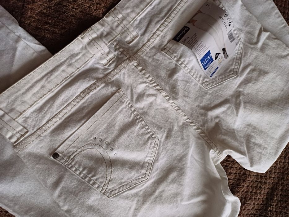 Nowe białe spodnie damskie jeansy 42/ 44