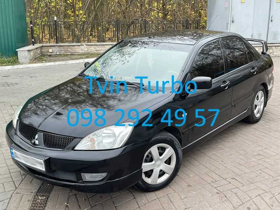 Накладки на пороги спойлер юбки реснички клыки Mitsubishi Lancer 9 10