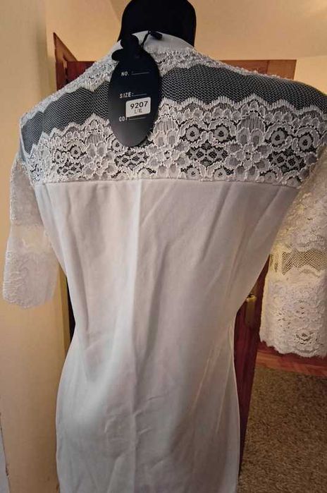 Biała ślubna sukienka z koronką r. L/XL