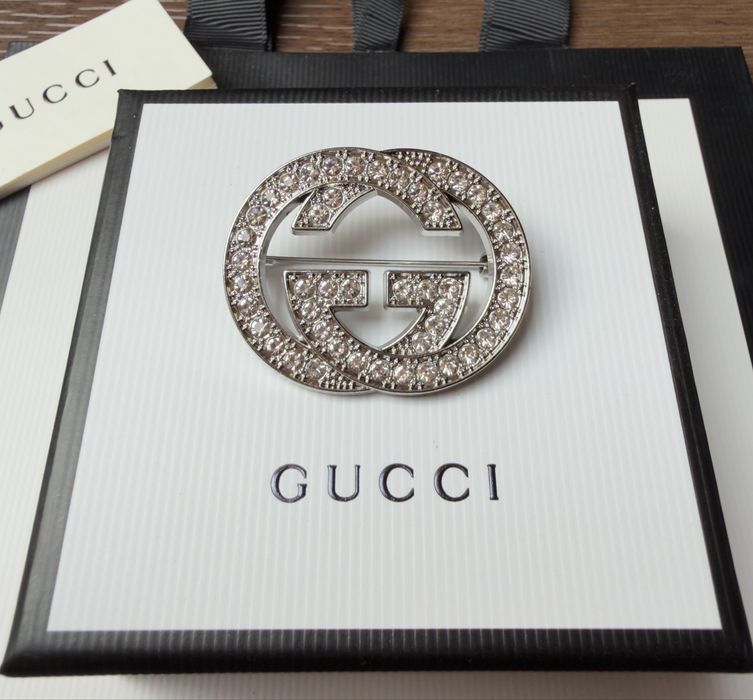 Broszka Gucci srebrna z cyrkoniami