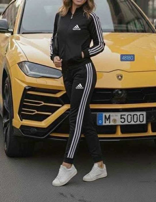 M.L.XL,-Dres damski "śliskawy " czarny z lampasami.