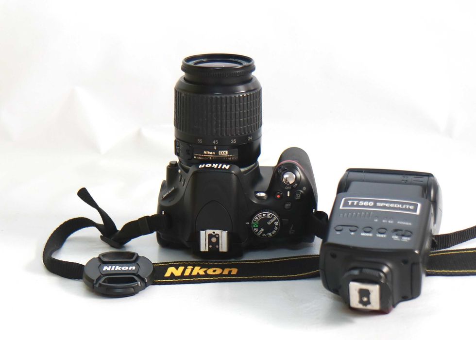 Nikon D5100 com lente Nikon 18-55mm (LER DESCRIÇÃO)