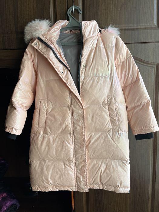Зимовий пуховик рожевого кольору