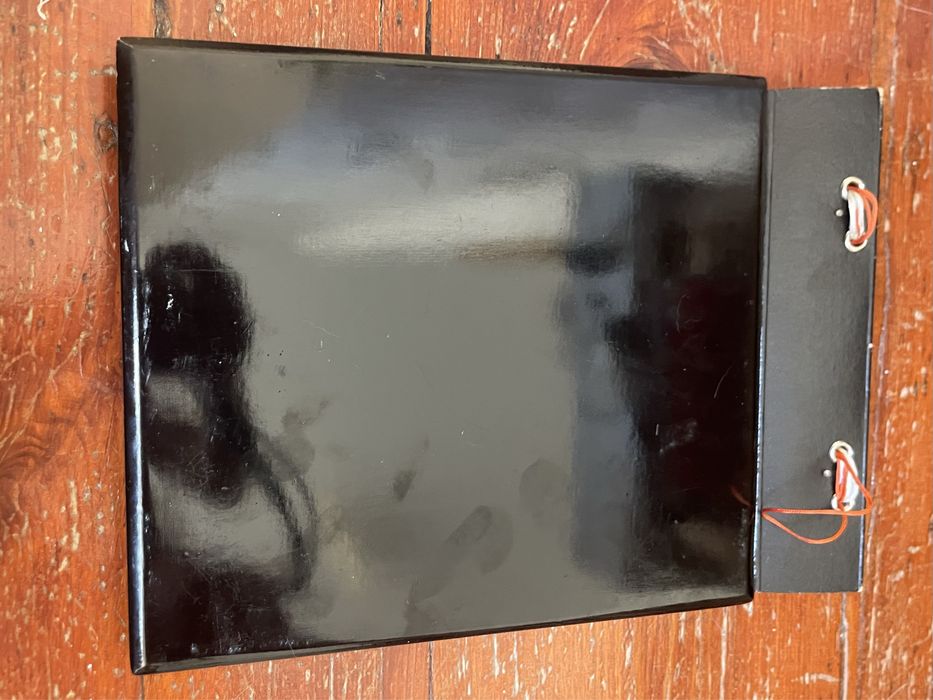 Álbum de fotos com capa lacada