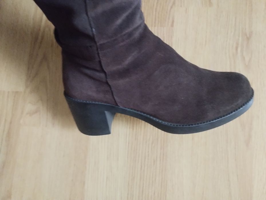 Продам сапоги.Продам евро сапогі коричневі практично нові .