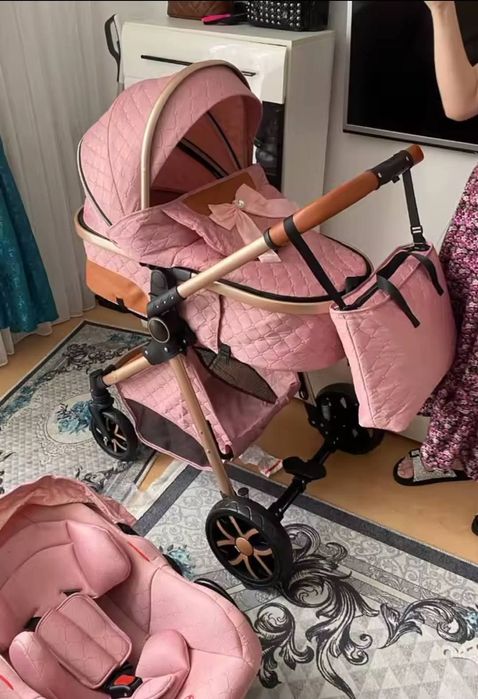 Carrinho trio de bebe rosa