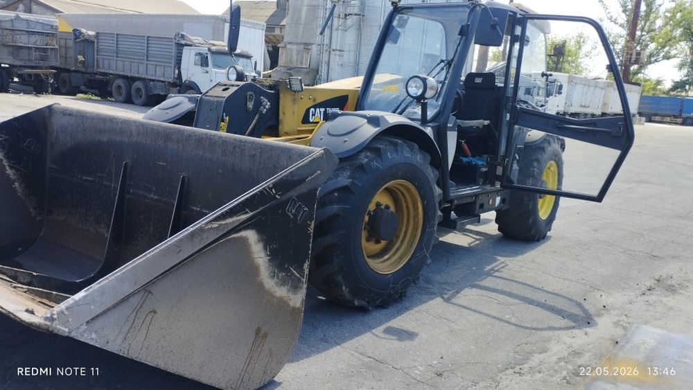 Продам телескопический погрузчик cat 407 c