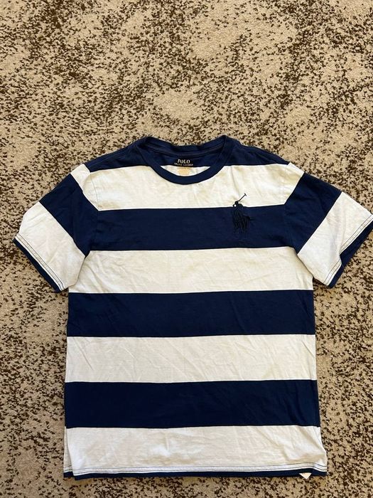 Футболка поло с розмір