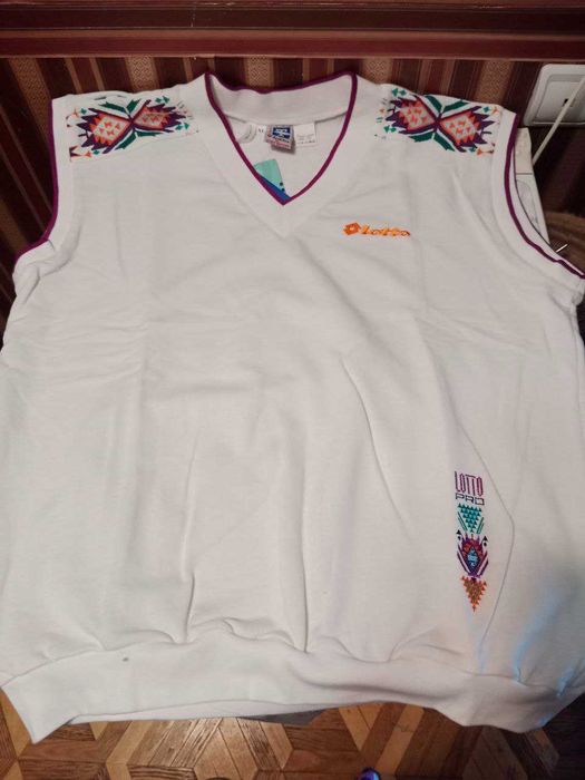 Мужской джемпер-безрукавка фирмы "Lotto". Новый.