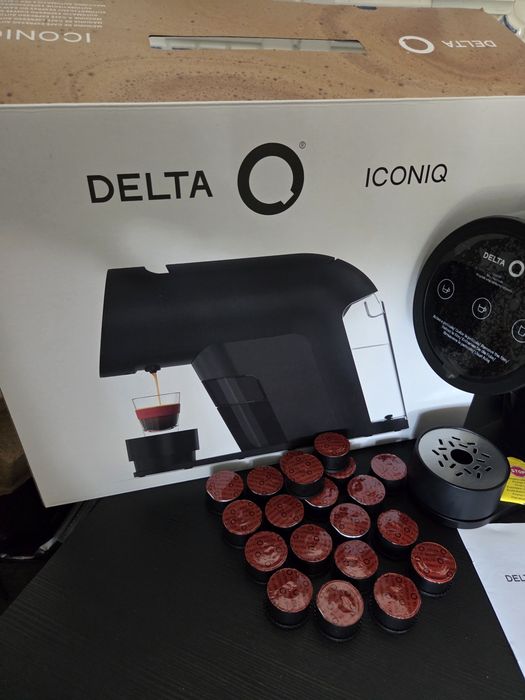 Máquina de Café Delta Q Iconiq última Geração oferta de 20 cafés e suporte de Cápsulas.
