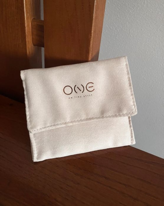 pulseira ONE coracao dourado e medalha prata