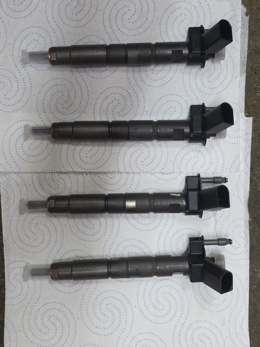 Wtryskiwacze wtryski BMW B47 25D 851415104