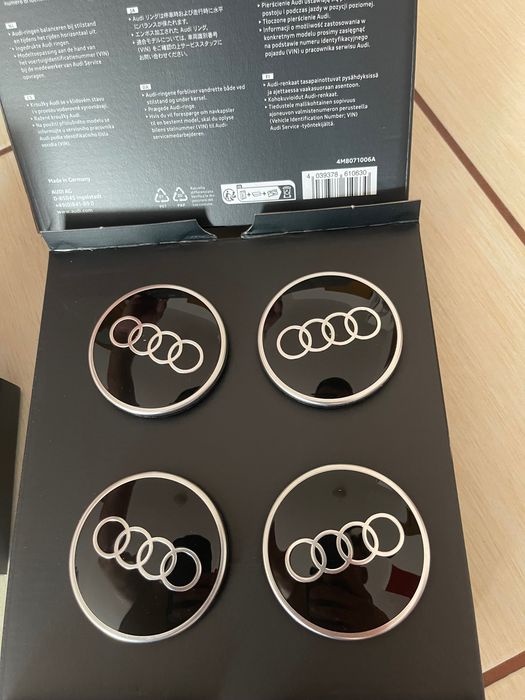 Оригінальні заглушки на маточину колеса (ковпачки в диски) Audi з плаваючими кільцями — комплект 4 шт.