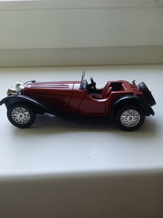 Jaguar SS 100.Фирма New Ray.Масштаб 1.43.Сделано в Китае.