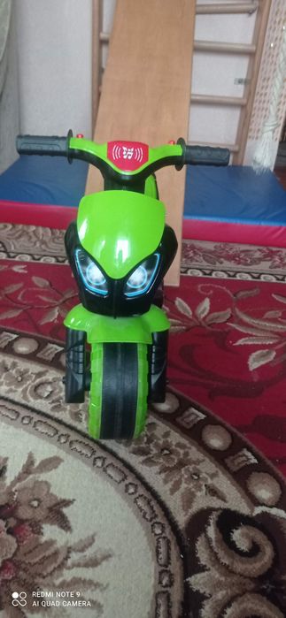 Музыкальный мотоцикл каталка,
5774