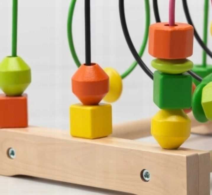 Ikea przekładanka + przebijak - drewniane topowe zabawki sensoryczne