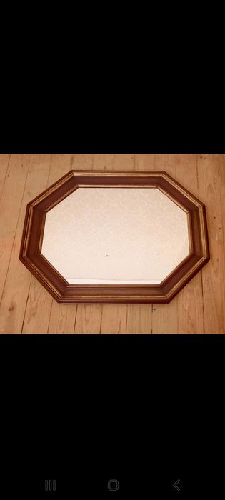 Espelho em madeira lacado a dourado