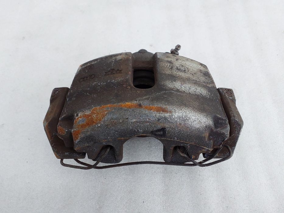 Pinça travão / maxila de travão frente esquerda VOLKSWAGEN Scirocco (1