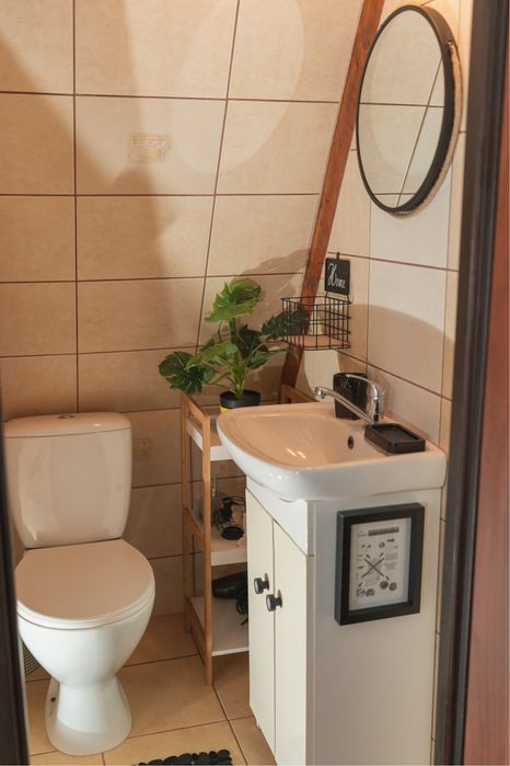 Domek nad jeziorem Warmia i Mazury łódka pomost