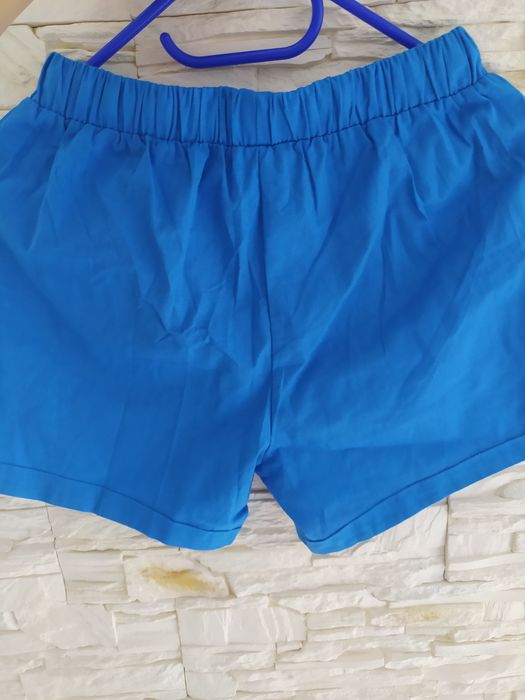 Nowe niebieskie spodenki kieszonki 38/40