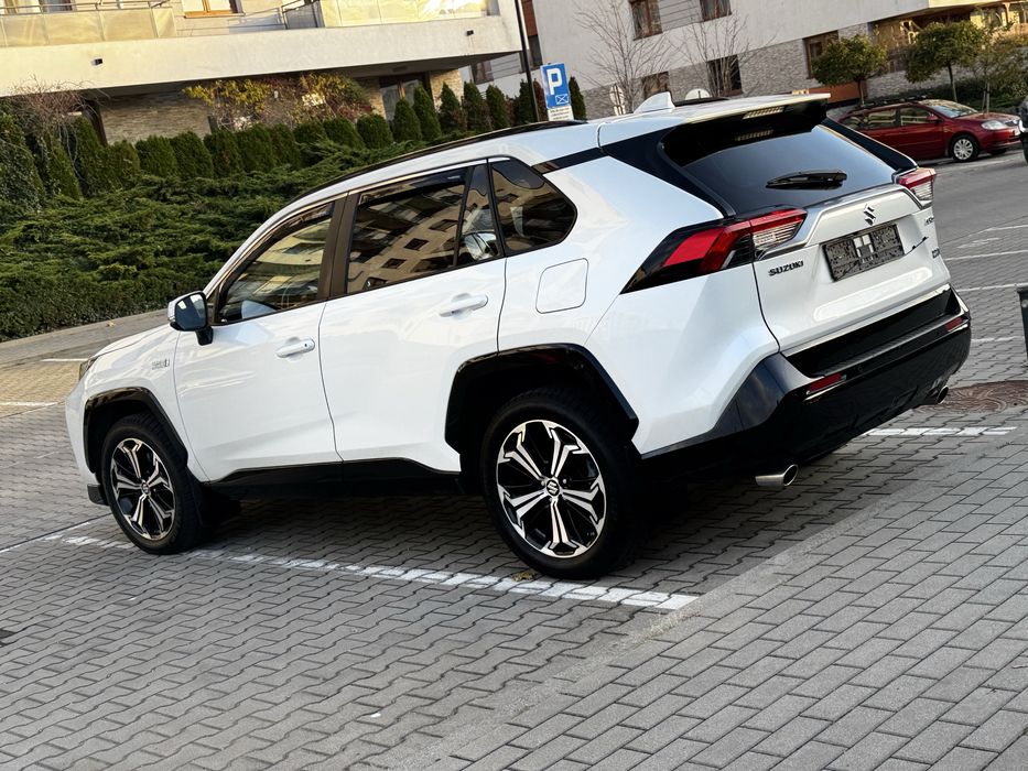 Suzuki -Toyota Rav 4