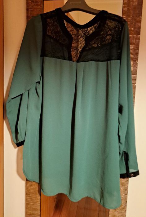 Blusa T.XL- com manga Versátil- medida de peito 60