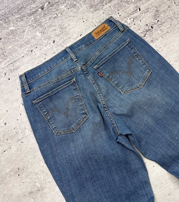 Spodnie jeansowe LEVIS 515 Bootcut dzwony niebieskie Jeans r. 27/32